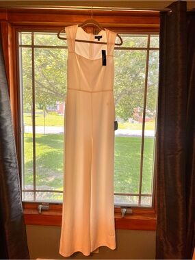 Lulu’s Enticing Endeavors White Jumpsuit